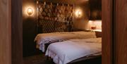 A treatment room with two beds at the Field Trip Spa, Brighton