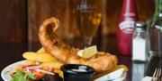 A plate of fish and chips.