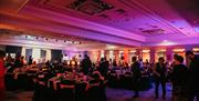 A room full of people celebrating at the DoubleTree by Hilton Brighton Metropole