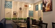 The dining area at The Golden Peacock