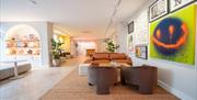 Comfortable seating in the gallery.
