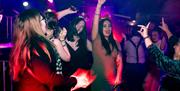 Komedia Christmas Party - partygoers enjoying a night out, on the dancefloor