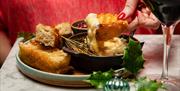 Dishes of delicious steak and sides at Kindling in Brighton