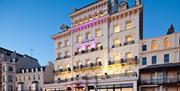 Exterior photo of the Mercure Brighton hotel taken at dusk