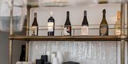 Helm Gallery - bottles of wine in the bar