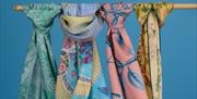Royal Pavilion scarves on blue billow