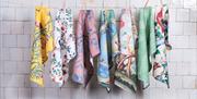 Royal Pavilion tea towels hanging in the Great Kitchen