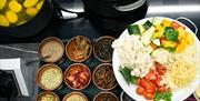 Spices and vegetable at Community Kitchen