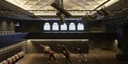 Image courtesy of Richard Chivers. Performers rehearse inside the Brighton Dome studio Theatre