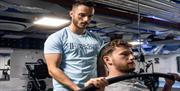 Gym users enjoying using the weights at Pro Academy