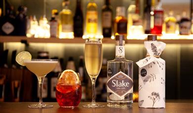 Slake Spirits - drinks and bottles on the bar