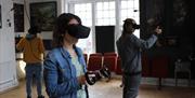 GOVR café - visitors inside virtual room