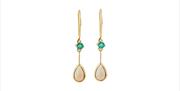 Gold ear rings with green stones