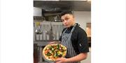 Chef with Pizza