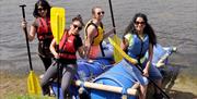 Ladies raft building