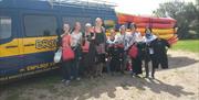 Brighton Watersports - kayaking group outside minibus