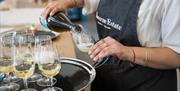 Albourne Wine Estate - pouring wine into a glass