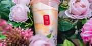 Gong cha Tea - cup surrounded by flowers