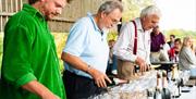 Great British Wine Tours - pouring wine