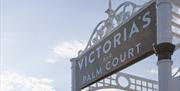 Victoria's Bar and Palm Court sign