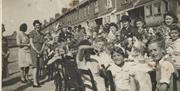 VE Day street party in May 1945. Fuller Road. (Kevin's grandmother is top right in black hat)
