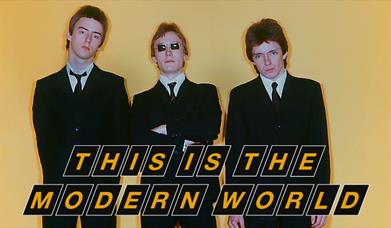 Exhibition poster showing the band the Jam.