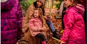 children autumn scene Wakehurst