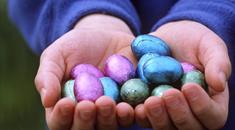 Easter in Bristol - National Trust Tyntesfield Egg Hunt. Hands holding Easter eggs.
