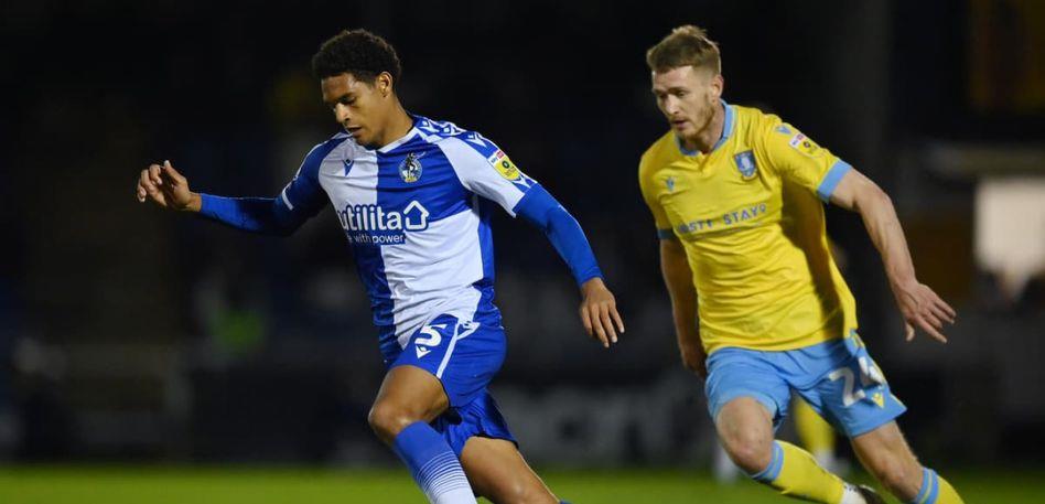 Bristol Rovers number 5 moves away from Sheffield Wednesday number 24