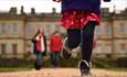 Child running at Dyrham Park
