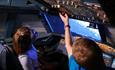 children in aircraft simulator