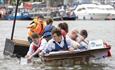 People in small boat at Bristol Harbour Festival