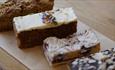 Selection of cakes (Carrot, blueberry Bakewell, flapjack)