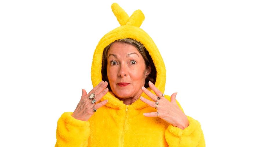 Nikky Smedley wearing a yellow teletubby suit