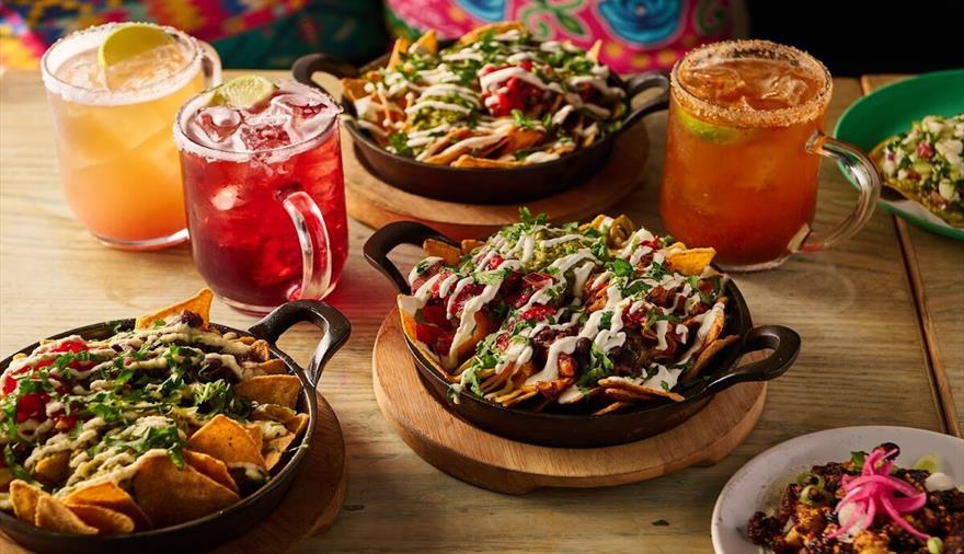 Cocktails and fully loaded nachos