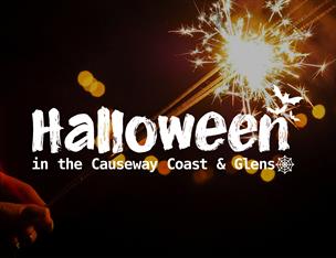 image of person's hand holding a sparkler. text reads 'Halloween in the Causeway Coast & Glens'