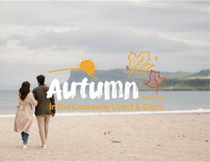 text reads 'Autumn in the Causeway Coast & Glens' with a couple walking on Ballycastle Beach with Fairhead in the distance