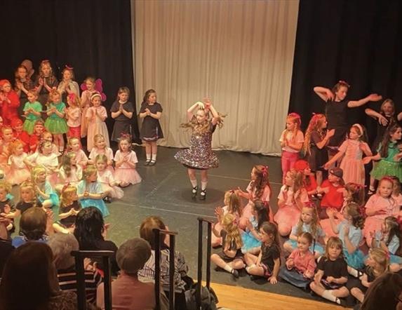 Image of Irish dancers performing on stage at Roe Vallet Arts Centre.