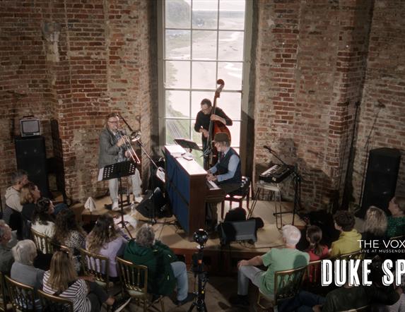 A photograph of Duke Special performing in Mussenden Temple.