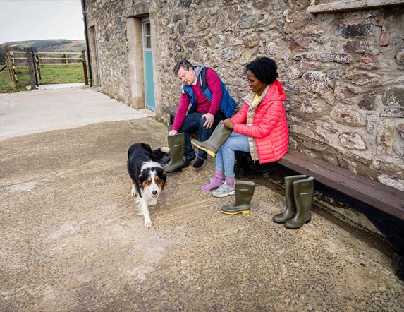 Visitors to Dunfin Sheep Farm get dressed in wellington boots and jackets suitable for being out in the fields