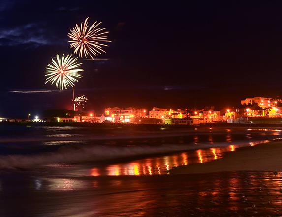 Fireworks light up the sky above Ramore Head
