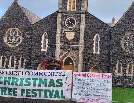 Holy Trinity Church with Christmas Tree Festival banner