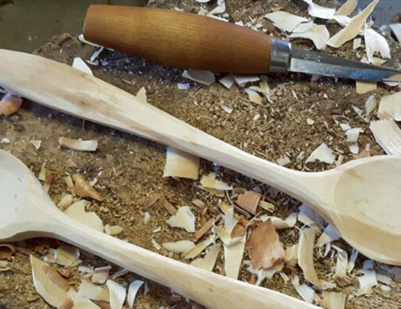 Wooden spoons in the process of being carved.