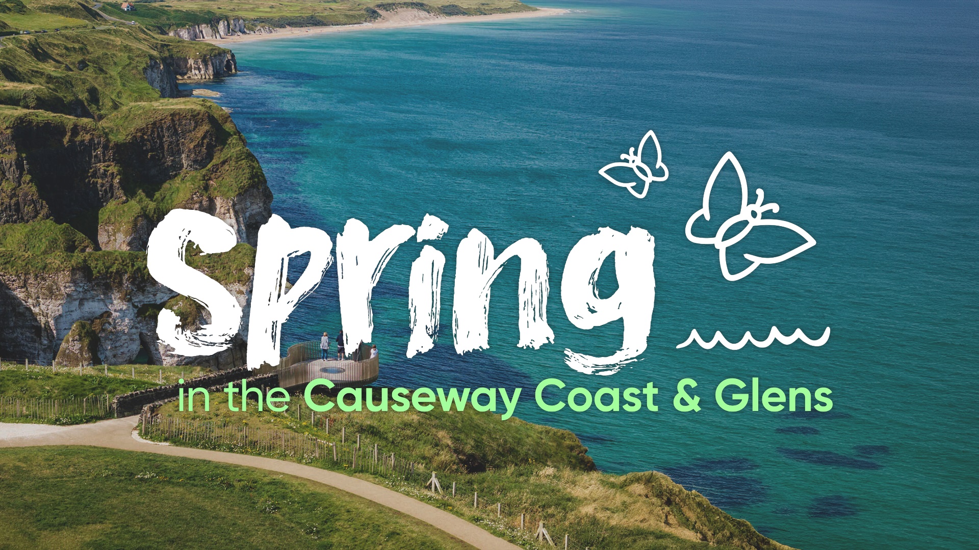 text reads 'Spring in the Causeway Coast & Glens' on an image of Dunluce Castle on a bright, spring day