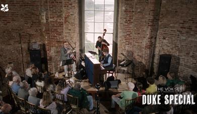A photograph of Duke Special performing in Mussenden Temple.
