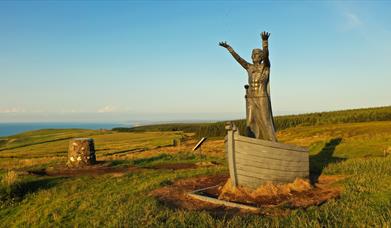 statue of Mannanan Mac Lir atop Binevenagh Mountain