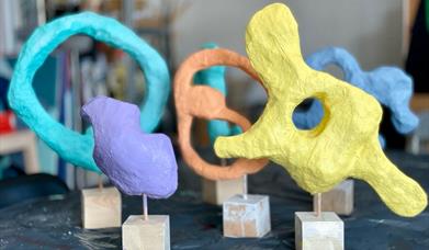 a set up abstract clay sculptures