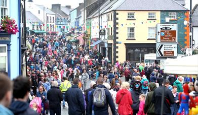 Crowds line the street in the Diamond