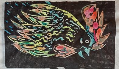 lino print of a colourful rooster