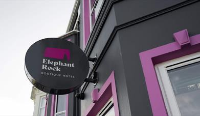 Exterior signage for Elephant Rock Hotel